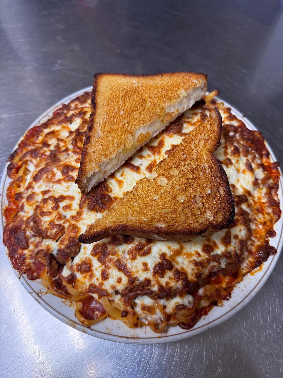 Penne Ala De Pappa at Pappa's Family Restaurant Edmonton - specialty pasta with ham, mushroom, and Italian salami