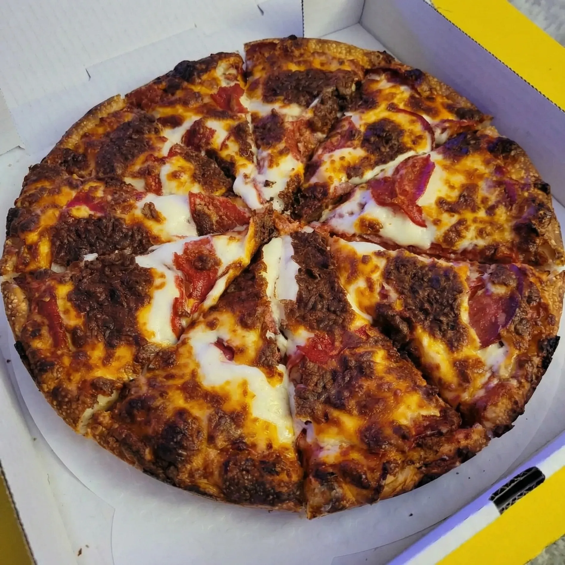 Pepperoni Pizza at Pappa's Family Restaurant Edmonton - Thick crust pizza with generous toppings